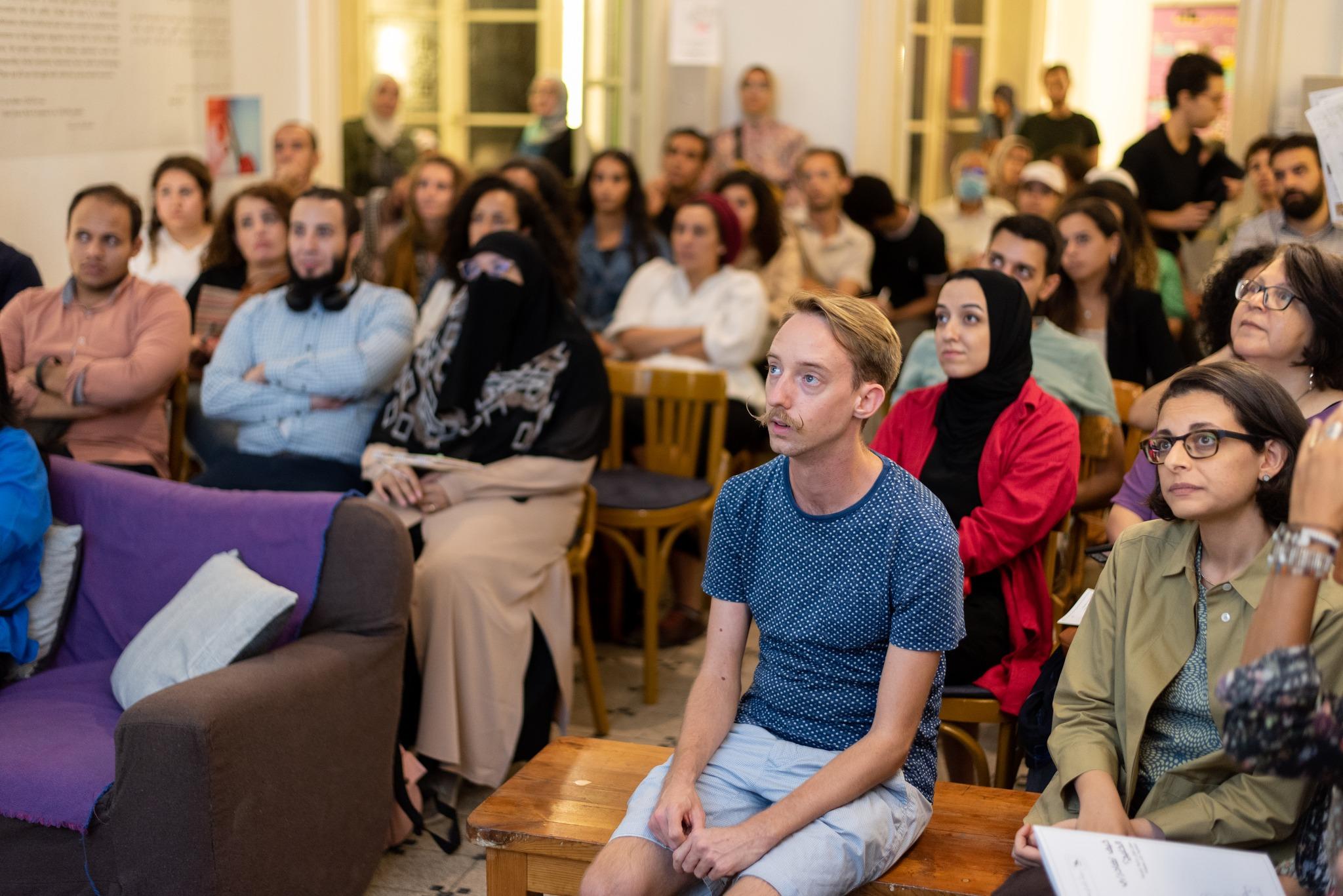 Figure 6: Audience at a public talk and panel discussion (Farida Youssef, bottom right)