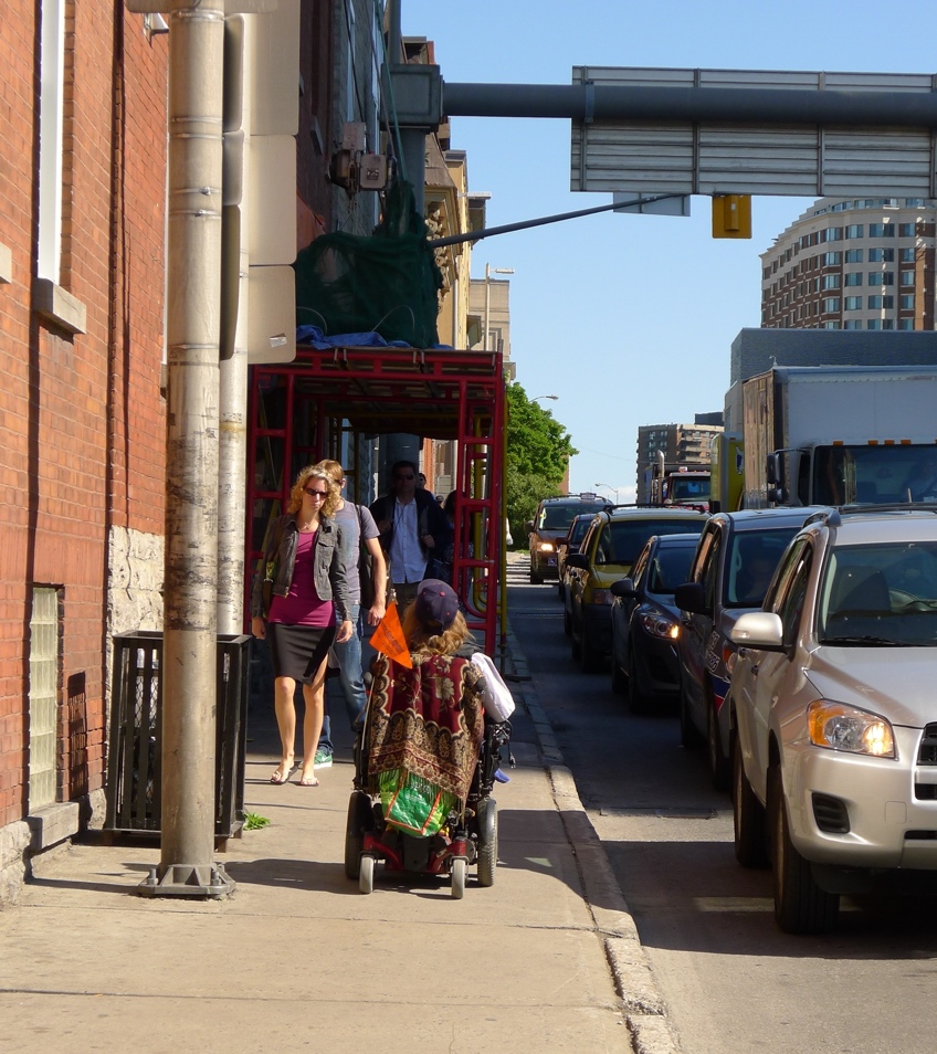 Figure 3. Drivers and sidewalk users in downtown Ottawa, Canada, in 2012
